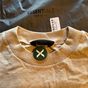 Mens Essentials Fear of God T Shirt
Oatmeal